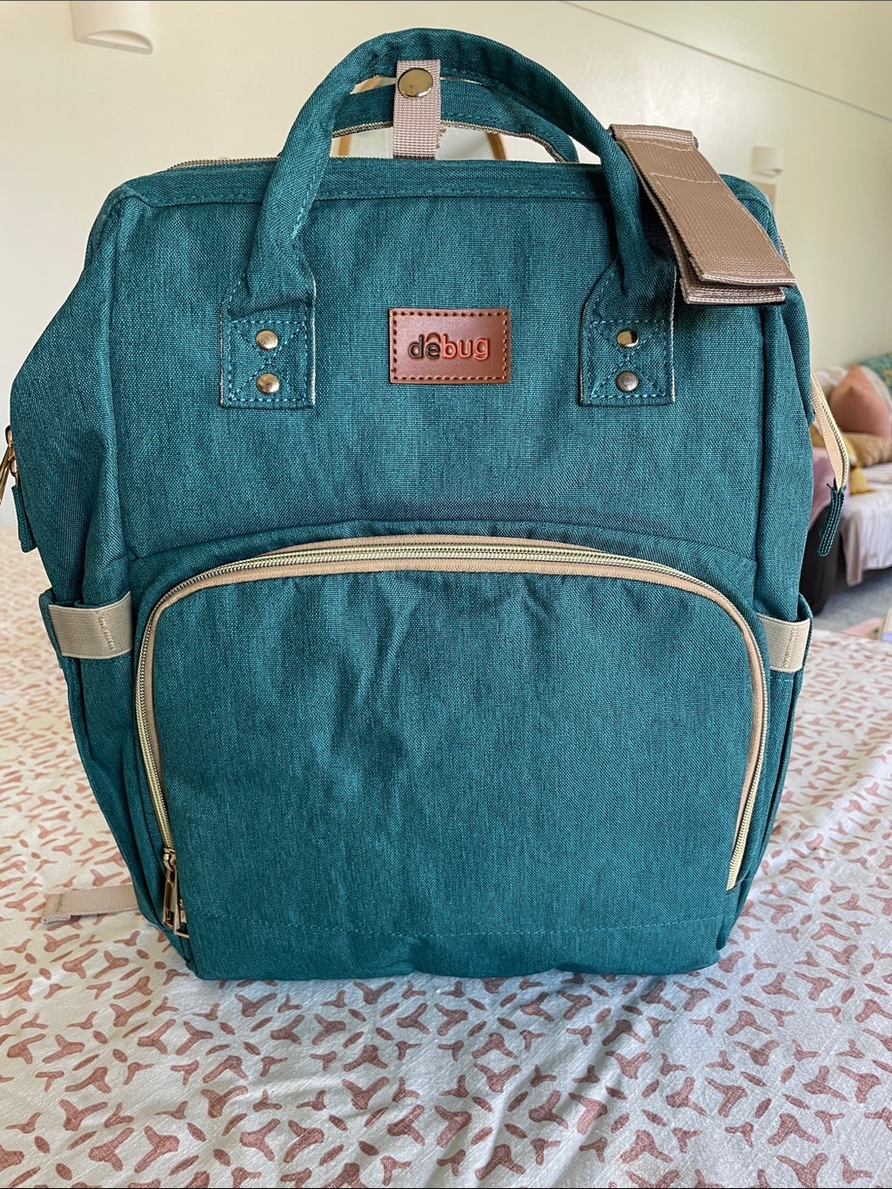 DEBUG Convertable Diaper Bag With Portable Changing Table. Teal color.